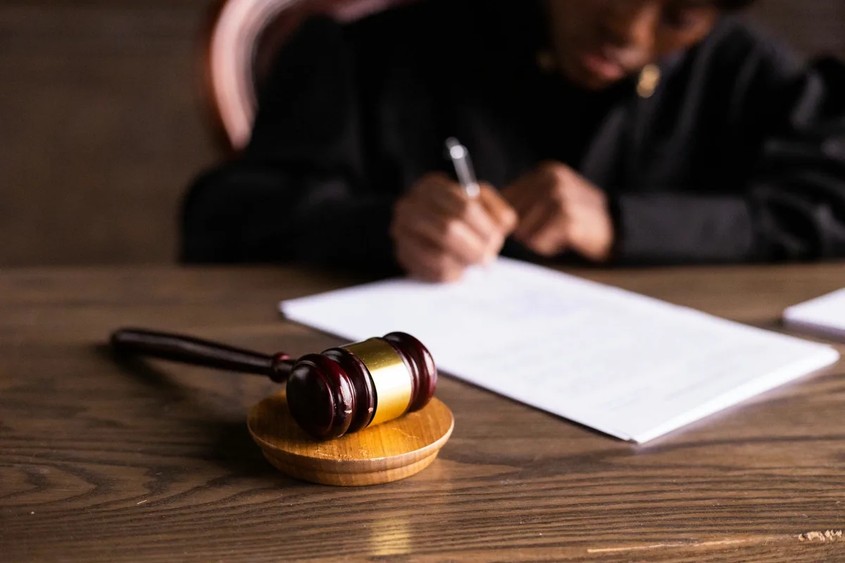 Court documents and gavel representing a writ of execution
