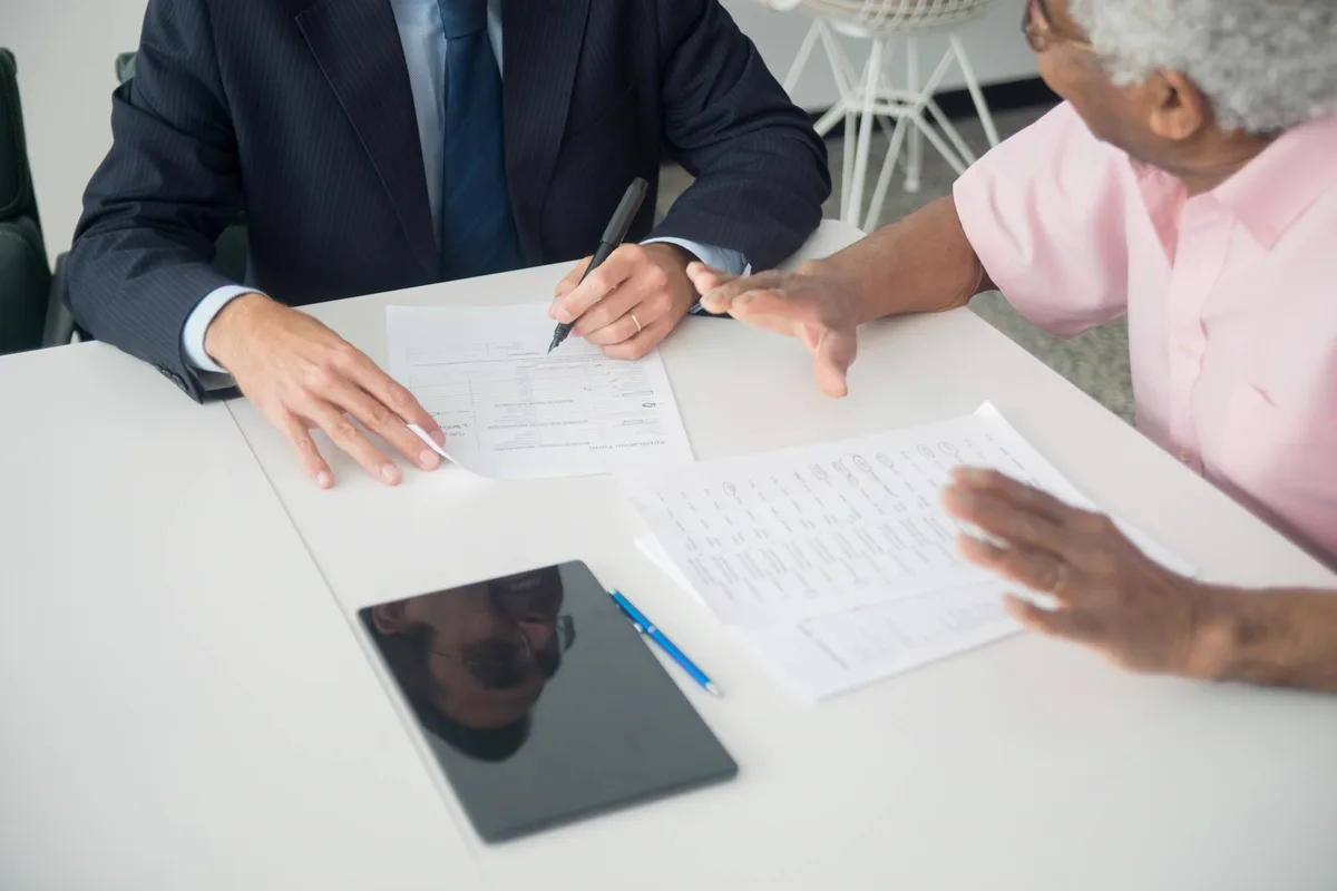 An NCR-registered debt counsellor consulting with a client in South Africa